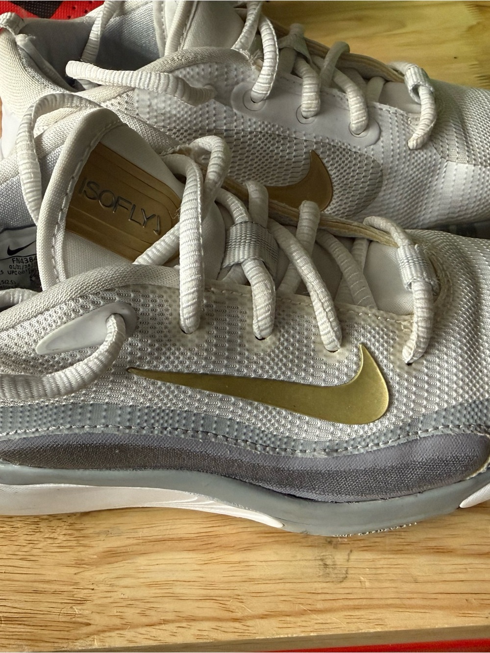 Nike White IsoFly with Gold Swoosh and Gray Trim 2.5 Youth